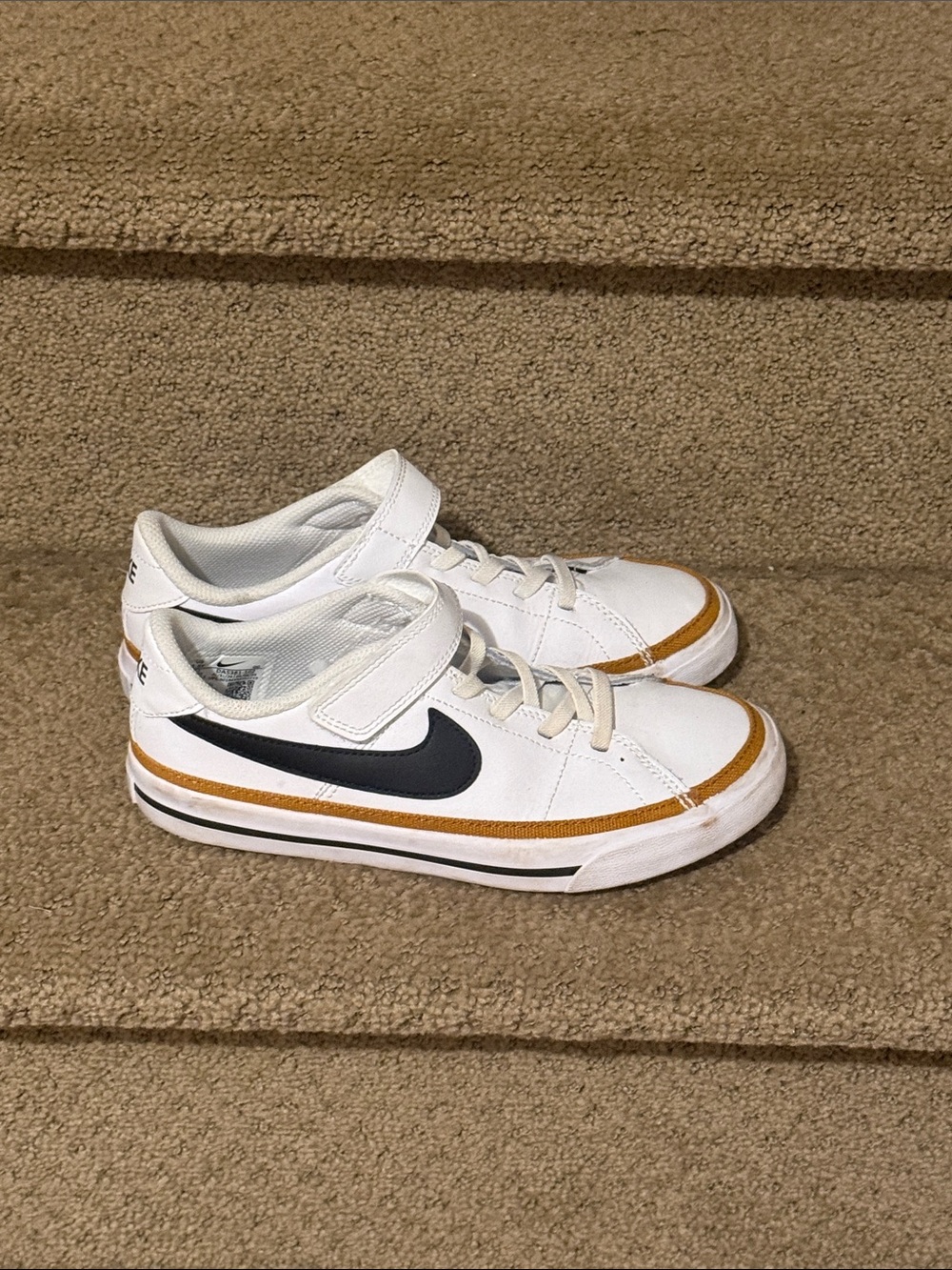 Nike Kids White Sneakers with Black Swoosh & Gold Trim